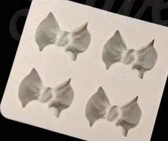 4 hole bow knot silicone mold mould